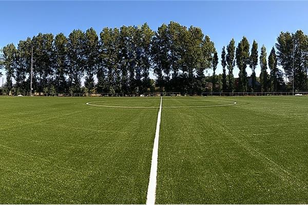 Aanleg kunstgras voetbalveld - Sportinfrabouw NV